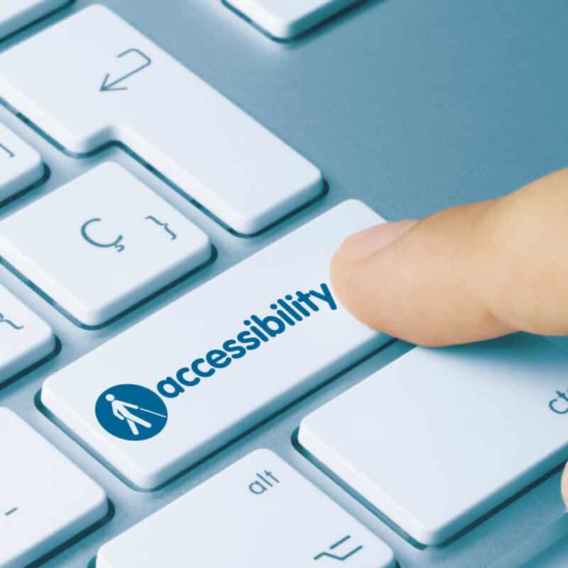 Accessibility - Inscription on Blue Keyboard Key.