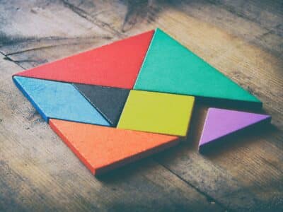 Basic On-Page SEO Components represented by tangram puzzle pieces