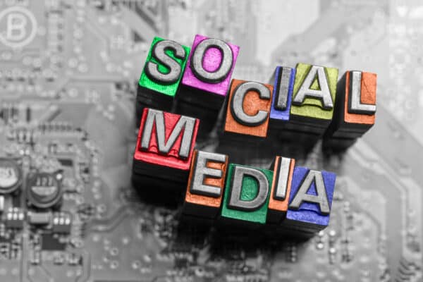 Print letter blocks spelling out Social Media Services